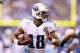 INDIANAPOLIS, IN - DECEMBER 09: Kenny Britt #18 of the the Tennessee Titans runs with the ball during the NFL game against the Indianapolis Colts at Lucas Oil Stadium on December 9, 2012 in Indianapolis, Indiana. (Photo by Andy Lyons/Getty Images)