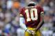 LANDOVER, MD - DECEMBER 09: Robert Griffin III #10 of the Washington Redskins waits between plays during a game against the Baltimore Ravens at FedExField on December 9, 2012 in Landover, Maryland. (Photo by Patrick McDermott/Getty Images)