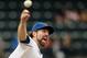 NEW YORK, NY - SEPTEMBER 22: R.A. Dickey #43 of the New York Mets pitches against the Miami Marlins at Citi Field on September 22, 2012 in the Flushing neighborhood of the Queens borough of New York City. (Photo by Alex Trautwig/Getty Images)
