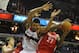 Jan 16, 2012; Washington , DC, USA; Houston Rockets center Jordan Hill (27) grabs a rebound over Washington Wizards center JaVale McGee (34) during the second half at the Verizon Center. The Rockets defeated the Wizards 114 - 106. Mandatory Credit: Brad Mills-USA TODAY Sports