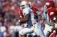 13 Nov 1999: Tee Martin #17 of the Tennessee Volunteers carries the ball during the game against the Arkansas Razorbacks in Fayetteville, Arkansas. The Razorbacks defeated the Volunteers 28-24. Mandatory Credit: Brian Bahr /Allsport
