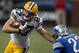 Nov 18, 2012; Detroit, MI, USA; Green Bay Packers wide receiver Jordy Nelson (87) stiff arms Detroit Lions cornerback Chris Houston (23) during the fourth quarter at Ford Field. Packers beat the Lions 24-20. Mandatory Credit: Raj Mehta-USA TODAY Sports
