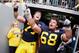 ANN ARBOR, MI - NOVEMBER 26: Mike Martin #68 and Taylor Lewan #77 of the Michigan Wolverines leave the field after a 40-34 victory over the Ohio State Buckeyes at Michigan Stadium on November 26, 2011 in Ann Arbor, Michigan. (Photo by Gregory Shamus/Getty Images)