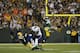 GREEN BAY, WI - SEPTEMBER 13: Tramon Williams #38 of the Green Bay Packers intercepts a pass intended for Brandon Marshall #15 of the Chicago Bears in the second half of the game at Lambeau Field on September 13, 2012 in Green Bay, Wisconsin. (Photo by Joe Robbins/Getty Images)