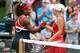 LONDON, ENGLAND - AUGUST 02: Serena Williams (L) of the United States shakes hands with Caroline Wozniacki (R) of Denmark in the Quarterfinals of Women's Singles Tennis on Day 6 of the London 2012 Olympic Games at Wimbledon on August 2, 2012 in London, England. (Photo by Clive Brunskill/Getty Images)
