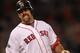BOSTON, MA - JUNE 5: Kevin Youkilis #20 of the Boston Red Sox reacts after flying out against the Baltimore Orioles at Fenway Park June 5, 2012 in Boston, Massachusetts. (Photo by Jim Rogash/Getty Images)