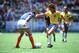JUN 1986: ZICO OF BRAZIL TAKES ON AN UNIDENTIFIED FRENCH DEFENDER DURING THE 1986 WORLD CUP IN MEXICO. BRAZIL BEAT FRANCE 5-4. Mandatory Credit: David Cannon/ALLSPORT