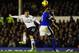 LIVERPOOL, ENGLAND - DECEMBER 09: Everton player Sylvain Distin can only watch as Spurs player Gylfi Sigurdsson gets in a shot at goal during the Barclays Premier game between Everton and Tottenham Hotspur at Goodison Park on December 9, 2012 in Liverpool, England. (Photo by Stu Forster/Getty Images)