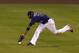DENVER, CO - SEPTEMBER 11: Center fielder Dexter Fowler #24 of the Colorado Rockies is unable to catch a pop fly by Gregor Blanco #7 of the San Francisco Giants that was blown by the wind in the fourth inning at Coors Field on September 11, 2012 in Denver, Colorado. (Photo by Doug Pensinger/Getty Images)