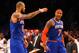 NEW YORK, NY - DECEMBER 11: Carmelo Anthony #7 of the New York Knicks celebrates scoring a basket with Tyson Chandler #6 against the Brooklyn Nets during their game at the Barclays Center on December 11, 2012 in the Brooklyn borough of New York City. NOTE TO USER: User expressly acknowledges and agrees that, by downloading and/or using this photograph, user is consenting to the terms and conditions of the Getty Images License Agreement. (Photo by Al Bello/Getty Images)