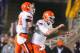 Nov 3, 2012; Manhattan, KS, USA; Oklahoma State Cowboys wide receiver Austin Hays (84) and quarterback Wes Lunt (right) celebrate a touchdown during the first half against the Kansas State Wildcats at Bill Snyder Family Stadium.Mandatory Credit: Scott Sewell-USA TODAY Sports
