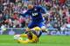 SUNDERLAND, ENGLAND - MAY 13: Wayne Rooney of Manchester Uinted in action with Simon Mignolet of Sunderland during the Barclays Premier League match between Sunderland and Manchester United at the Stadium of Light on May 13, 2012 in Sunderland, England. (Photo by Michael Regan/Getty Images)