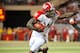 LINCOLN, NE - SEPTEMBER 29: Running back Montee Ball #28 of the Wisconsin Badgers stiff arms safety P.J. Smith #13 of the Nebraska Cornhuskers during their game at Memorial Stadium on September 29, 2012 in Lincoln, Nebraska. (Photo by Eric Francis/Getty Images)