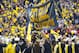November 26, 2011; Ann Arbor, MI, USA; Michigan Wolverines safety Jared Van Slyke (31) hit the go blue banner before the game against the Ohio State Buckeyes at Michigan Stadium. Mandatory Credit: Rick Osentoski-USA TODAY Sports