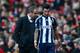LONDON, ENGLAND - DECEMBER 08: Manager Steve Clarke of West Bromwich Albion speaks to Liam Ridgewell of West Bromwich Albion as he is substituted during the Barclays Premier League match between Arsenal and West Bromwich Albion at Emirates Stadium on December 8, 2012 in London, England. (Photo by Clive Mason/Getty Images)