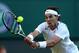 LONDON, ENGLAND - JUNE 28: Rafael Nadal reaches for a shot during his Gentlemen's Singles second round match against Lukas Rosol of the Czech Republic on day four of the Wimbledon Lawn Tennis Championships at the All England Lawn Tennis and Croquet Club on June 28, 2012 in London, England. (Photo by Clive Rose/Getty Images)