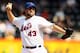 NEW YORK, NY - SEPTEMBER 27: R.A. Dickey #43 of the New York Mets pitches against the Pittsburgh Pirates at Citi Field on September 27, 2012 in the Flushing neighborhood of the Queens borough of New York City. (Photo by Alex Trautwig/Getty Images)