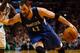 BOSTON, MA - DECEMBER 05: Kevin Love #42 of the Minnesota Timberwolves drives to the basket in front of Brandon Bass #30 of the Boston Celtics during the game on December 5, 2012 at TD Garden in Boston, Massachusetts. NOTE TO USER: User expressly acknowledges and agrees that, by downloading and or using this photograph, User is consenting to the terms and conditions of the Getty Images License Agreement. (Photo by Jared Wickerham/Getty Images)