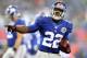 EAST RUTHERFORD, NJ - DECEMBER 09: David Wilson #22 of the New York Giants celebrates his third touchdown of the game against the New Orleans Saints on December 9, 2012 at MetLife Stadium in East Rutherford, New Jersey. (Photo by Elsa/Getty Images)
