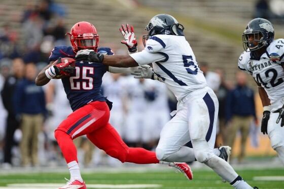 No 2,000, but Ka'Deem Carey Retains National Rushing Lead After Bowl Game
