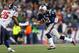 FOXBORO, MA - DECEMBER 10: Tom Brady #12 of the New England Patriots runs the ball for a first down against the Houston Texans in the second half at Gillette Stadium on December 10, 2012 in Foxboro, Massachusetts. (Photo by Jim Rogash/Getty Images)
