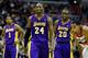 WASHINGTON, DC - DECEMBER 14: Kobe Bryant #24, Darius Morris #1, and Jodie Meeks #20 of the Los Angeles Lakers walk up the court past Shaun Livingston #14 of the Washington Wizards during the second half at Verizon Center on December 14, 2012 in Washington, DC. NOTE TO USER: User expressly acknowledges and agrees that, by downloading and or using this photograph, User is consenting to the terms and conditions of the Getty Images License Agreement. (Photo by Rob Carr/Getty Images)
