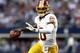 ARLINGTON, TX - NOVEMBER 22: Robert Griffin III #10 of the Washington Redskins throws the ball against the Dallas Cowboys during a Thanksgiving Day game at Cowboys Stadium on November 22, 2012 in Arlington, Texas. (Photo by Ronald Martinez/Getty Images)