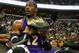 WASHINGTON, DC - DECEMBER 14: Dwight Howard #12 of the Los Angeles Lakers sits on the bench during the first half against the Washington Wizards at Verizon Center on December 14, 2012 in Washington, DC. NOTE TO USER: User expressly acknowledges and agrees that, by downloading and or using this photograph, User is consenting to the terms and conditions of the Getty Images License Agreement. (Photo by Rob Carr/Getty Images)