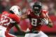ATLANTA, GA - NOVEMBER 18: Roddy White #84 of the Atlanta Falcons breaks a tackle by William Gay #22 of the Arizona Cardinals at Georgia Dome on November 18, 2012 in Atlanta, Georgia. (Photo by Kevin C. Cox/Getty Images)