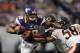 MINNEAPOLIS, MN - DECEMBER 9: Adrian Peterson #28 of the Minnesota Vikings carries the ball against Nick Roach #53 and Dom DeCicco #58 of the Chicago Bears during the fourth quarter of the game on December 9, 2012 at Mall of America Field at the Hubert H. Humphrey Metrodome in Minneapolis, Minnesota. The Vikings defeated the Bears 21-14. (Photo by Hannah Foslien/Getty Images)