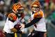 PHILADELPHIA, PA - DECEMBER 13: Andy Dalton #14 of the Cincinnati Bengals hands the ball off to BenJarvus Green-Ellis #42 in the first quarter against the Philadelphia Eagles on December 13, 2012 at Lincoln Financial Field in Philadelphia, Pennsylvania. (Photo by Elsa/Getty Images)