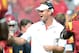 LOS ANGELES, CA - SEPTEMBER 22: Head coach Lane Kiffin of the USC Trojans reacts to the touchdown of Silas Redd #25 for a 7-0 lead over the California Golden Bears during the first quarter at Los Angeles Memorial Coliseum on September 22, 2012 in Los Angeles, California. (Photo by Harry How/Getty Images)