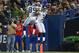 TORONTO, ON - DECEMBER 16: Russell Wilson #3 of the Seattle Seahawks celebrates his rushing touchdown with Doug Baldwin #89 during an NFL game against the Buffalo Bills at Rogers Centre on December 16, 2012 in Toronto, Ontario, Canada. (Photo by Tom Szczerbowski/Getty Images)