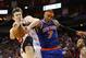 November 23, 2012; Houston, TX, USA; Houston Rockets center Omer Asik (3) and New York Knicks small forward Carmelo Anthony (7) battle for a rebound during the fourth quarter at Toyota Center. Mandatory Credit: Troy Taormina-USA TODAY Sports