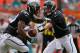 MIAMI GARDENS, FL - DECEMBER 16: Chad Henne #7 of the Jacksonville Jaguars hands off to Keith Toston #35 of the Jacksonville Jaguars during a game against the Miami Dolphinsat Sun Life Stadium on December 16, 2012 in Miami Gardens, Florida. (Photo by Mike Ehrmann/Getty Images)