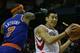 HOUSTON, TX - NOVEMBER 23: Jeremy Lin #7 of the Houston Rockets drives past Carmelo Anthony #7 of the New York Knicks at the Toyota Center on November 23, 2012 in Houston, Texas. NOTE TO USER: User expressly acknowledges and agrees that, bagainst the Newy downloading and or using this photograph, User is consenting to the terms and conditions of the Getty Images License Agreement. (Photo by Scott Halleran/Getty Images)