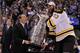VANCOUVER, BC - JUNE 15: NHL Commissioner Gary Bettman presents the Stanley cup to Zdeno Chara #33 of the Boston Bruins after defeating the Vancouver Canucks in Game Seven of the 2011 NHL Stanley Cup Final at Rogers Arena on June 15, 2011 in Vancouver, British Columbia, Canada. The Boston Bruins defeated the Vancouver Canucks 4 to 0. (Photo by Bruce Bennett/Getty Images)