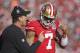 Dec 9, 2012; San Francisco, CA, USA; San Francisco 49ers head coach Jim Harbaugh talks with quarterback Colin Kaepernick (7) during the second quarter against the Miami Dolphins at Candlestick Park. Mandatory Credit: Kelley L Cox-USA TODAY Sports