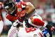 ATLANTA, GA - DECEMBER 16: Michael Turner #33 of the Atlanta Falcons hurdles over Jayron Hosley #28 of the New York Giants at Georgia Dome on December 16, 2012 in Atlanta, Georgia. (Photo by Kevin C. Cox/Getty Images)