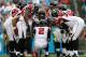 CHARLOTTE, NC - DECEMBER 09: Matt Ryan #2 of the Atlanta Falcons calls a play in the huddle during their game against the Carolina Panthers at Bank of America Stadium on December 9, 2012 in Charlotte, North Carolina. (Photo by Streeter Lecka/Getty Images)