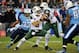 NASHVILLE, TN - DECEMBER 17: Quarterback Mark Sanchez #6 of the New York Jets is pressured by Michael Griffin #33 of the Tennessee Titans at LP Field on December 17, 2012 in Nashville, Tennessee. (Photo by Frederick Breedon/Getty Images)