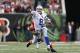 CINCINNATI, OH - DECEMBER 09: Tony Romo #9 of the Dallas Cowboys tosses the ball away while under pressure from Geno Atkins #97 of the Cincinnati Bengals during the game at Paul Brown Stadium on December 9, 2012 in Cincinnati, Ohio. Dallas won 20-19. (Photo by Joe Robbins/Getty Images)