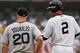 Teammates Kevin Youkilis and Derek Jeter