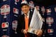 DETROIT, MI - OCTOBER 28: Laurence M. Baer President and Chief Executive Officer of the San Francisco Giants poses with the Commissioner's Trophy after Game Four of the Major League Baseball World Series at Comerica Park on October 28, 2012 in Detroit, Michigan. The San Francisco Giants defeated the Detroit Tigers 4-3 in the tenth inning to win the World Series in 4 straight games. (Photo by Matt Solcum - Pool/Getty Images)