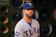 OAKLAND, CA - OCTOBER 02: Mike Napoli #25 of the Texas Rangers stands in the dugout before their game against the Oakland Athletics at O.co Coliseum on October 2, 2012 in Oakland, California. (Photo by Ezra Shaw/Getty Images)