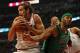 CHICAGO, IL - DECEMBER 18: Joakim Noah #13 of the Chicago Bulls grabs a rebound away from Chris Wilcox #44 of the Boston Celtics at the United Center on December 18, 2012 in Chicago, Illinois. NOTE TO USER: User expressly acknowledges and agrees that, by downloading and or using this photograph, User is consenting to the terms and conditions of the Getty Images License Agreement. (Photo by Jonathan Daniel/Getty Images)