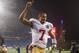 FOXBORO, MA - DECEMBER 17: Colin Kaepernick #7 of the San Francisco 49ers celebrates their 41-34 win over the New England Patriots while running off of the field following the game at Gillette Stadium on December 17, 2012 in Foxboro, Massachusetts. (Photo by Jared Wickerham/Getty Images)