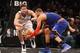 NEW YORK, NY - NOVEMBER 26: Brook Lopez #11 of the Brooklyn Nets and Tyson Chandler #6 of the New York Knicks battle for a loose ball at the Barclays Center on November 26, 2012 in the Brooklyn borough of New York City. NOTE TO USER: User expressly acknowledges and agrees that, by downloading and/or using this photograph, user is consenting to the terms and conditions of the Getty Images License Agreement. The Nets defeated the Knicks 96-89. (Photo by Bruce Bennett/Getty Images)