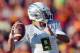 Nov 3, 2012; Los Angeles, CA, USA; Oregon Ducks quarterback Marcus Mariota (8) throws a pass against the Southern California Trojans at the Los Angeles Memorial Coliseum. Mandatory Credit: Kirby Lee/Image of Sport-USA TODAY Sports