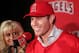 ANAHEIM, CA - DECEMBER 15: Josh Hamilton #32 of the Los Angeles Angels of Anaheim smiles as wife Katie looks on during the press conference introducing Hamilton as the team's newest member at ESPN Zone at Downtown Disney on December 15, 2012 in Anaheim, California. (Photo by Victor Decolongon/Getty Images)